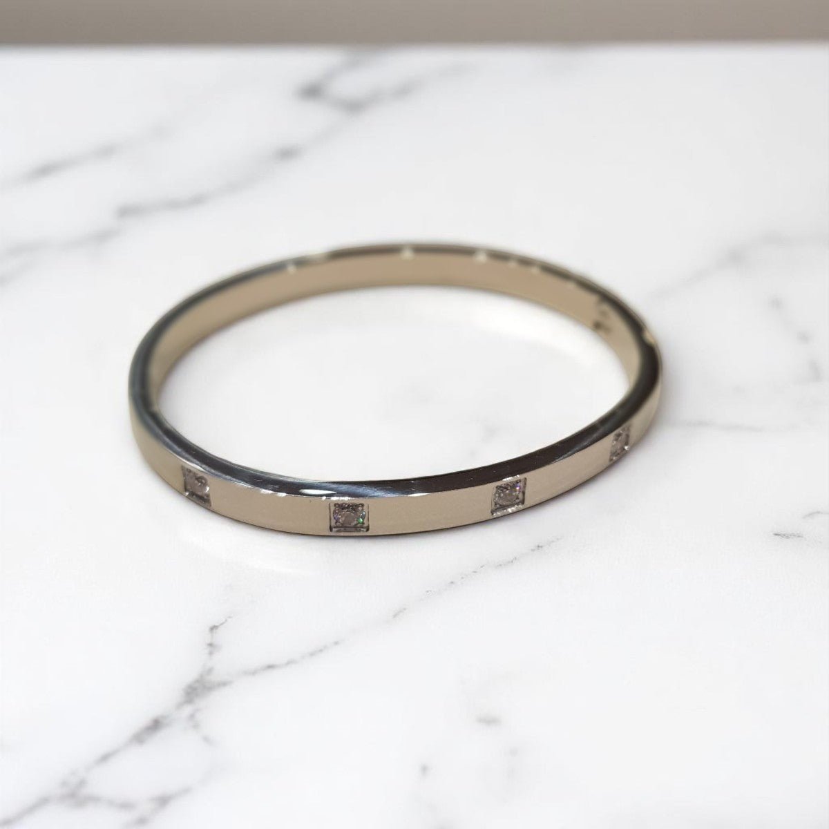 Elegant Silver bangle with Zirconias - MCA Design by Maria